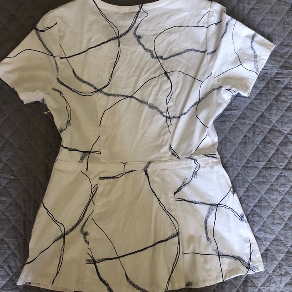 Jaanuu Peplum Top - Picture 4 of 5